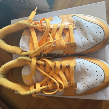 Orange and white sneakers