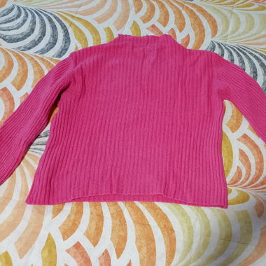 Maglioncino fucsia pancia scoperta a collo alto