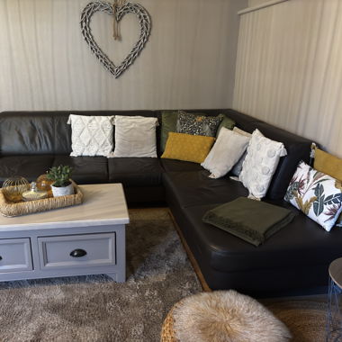 Brown leather corner sofa with seat 