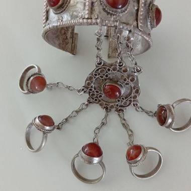 Silver ring bangle with red stones