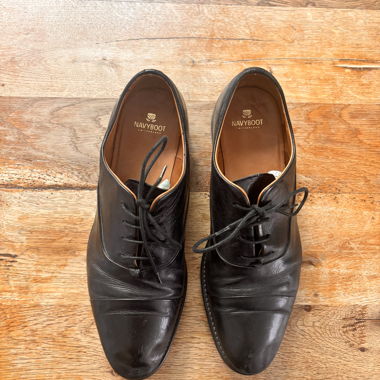 Black leather lace-up shoes