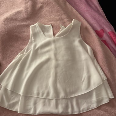 White sleeveless top