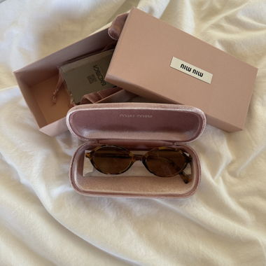 Occhiali da sole Miu Miu OMU 04ZS Light Havana