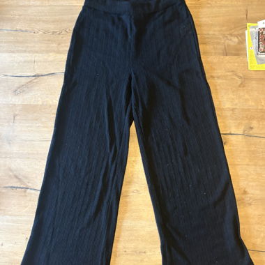 Black ribbed trousers
