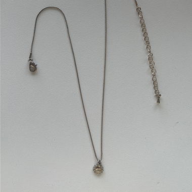 Collier en or avec pendentif soleil