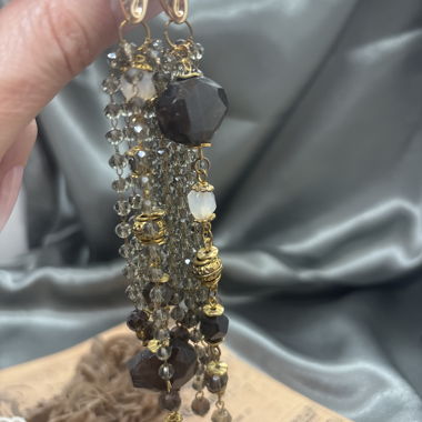 Dangle earrings with gold beads