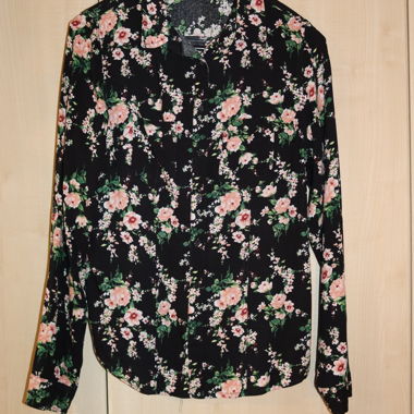 Blusa con motivo floreale