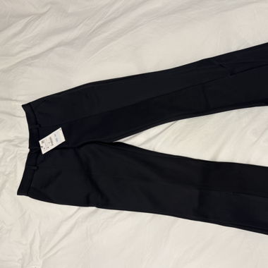 Pantaloni con Spacchi all'Orlo