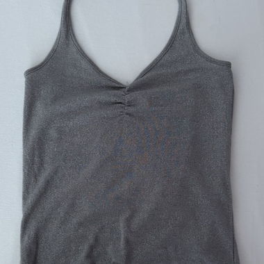Top con scollo halter glitter