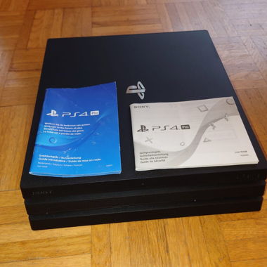PS4 Pro Console with Accessories and Games