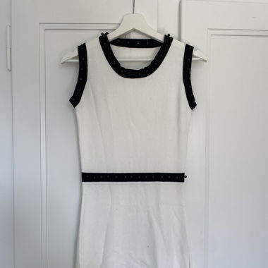 White dress with black pearls