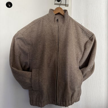 Beige zippered transitional jacket