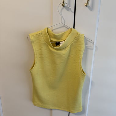 Yellow sleeveless top