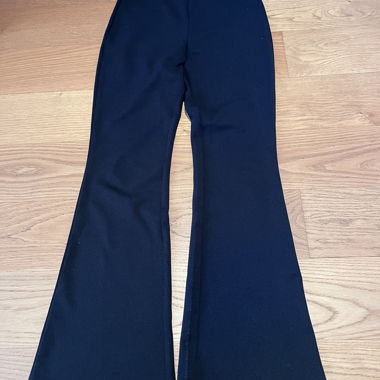 Black flared trousers