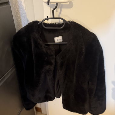 Veste en fourrure noire