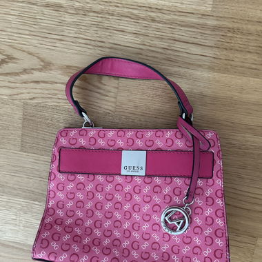 pink mini Guess monogram purse