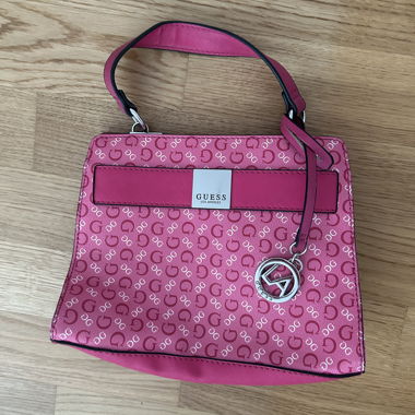 pink mini Guess monogram purse