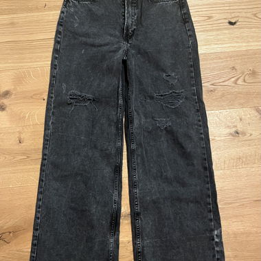Pantalon noirs avec des trous 
