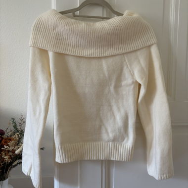 An oversized sweater and a short sweater