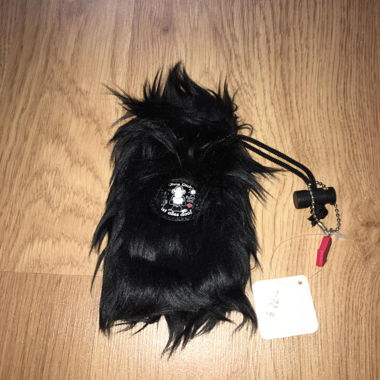 Black plush phone charm