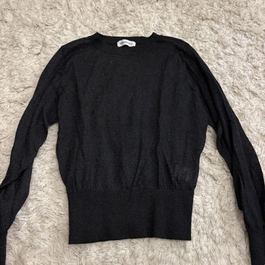 Schwarzer glitzernder Pullover