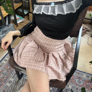 Minigonna svasata a quadri rosa
