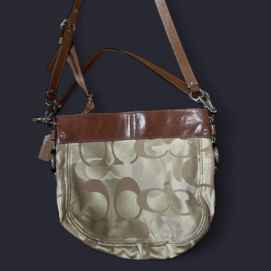 Tan and brown Coach crossbody / shoulder bag