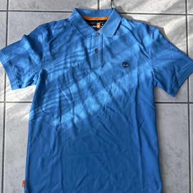 Timberland blue polo, size S