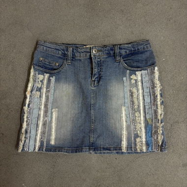 “Laced down” lace denim mini skirt