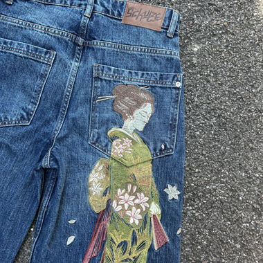 Jeans with embroidered Geisha