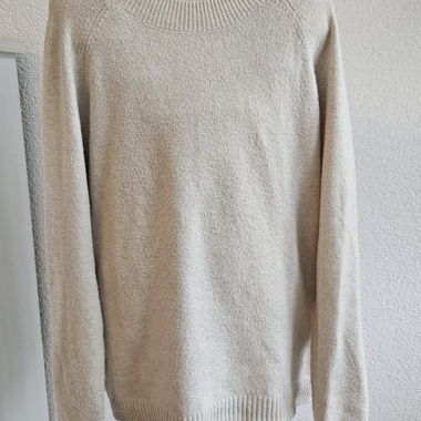 Pull beige col rond