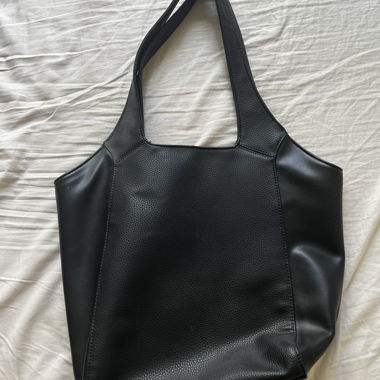 Black faux leather handbag