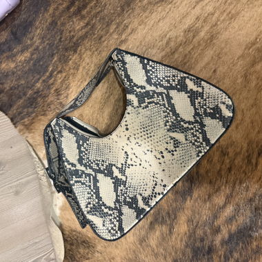 Borsa effetto serpente