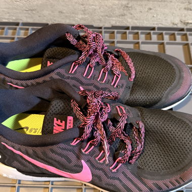 Chaussures de course Nike noir/rose