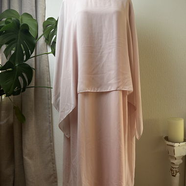 Blush pink ceremonial dress with pearl details