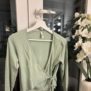 Pull cache cœur menthe