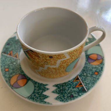 Porcelain teacups with saucers