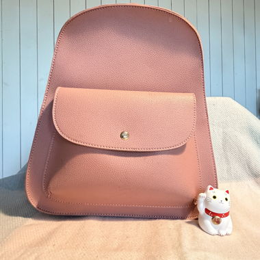 Backpack in pink faux leather