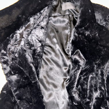 Gilet nero in pelliccia sintetica