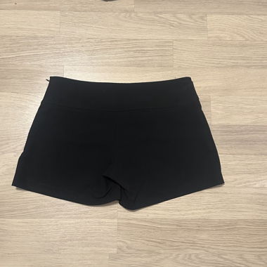 Black mini skort with metal ring detail