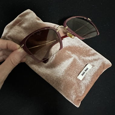 Miu Miu Sonnenbrille bordeaux
