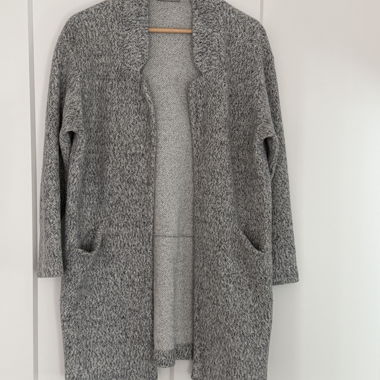 Cardigan en maille ouvert / manteau en maille