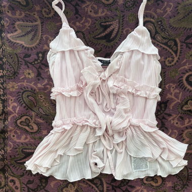 Pink frilly top