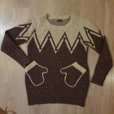 Maglione di Natale con tasca a muffola