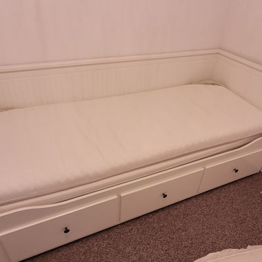 White sofa bed with drawers and mattresses