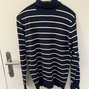 blue turtleneck sweater with white stripes