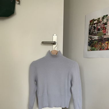 Light blue turtleneck sweater