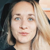 J.