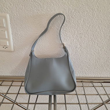 Small light blue handbag