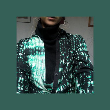 abstract or snake-themed blouse  இ